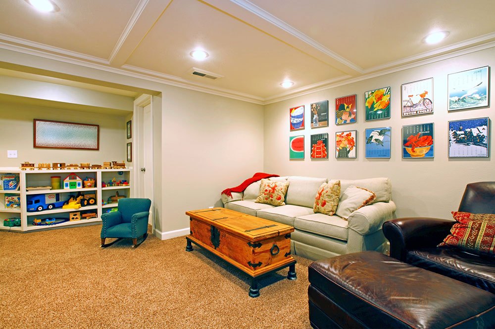 Play room in a white basement living room