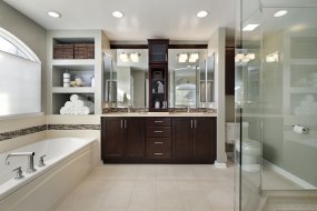Master bath with dark wood cabinetry