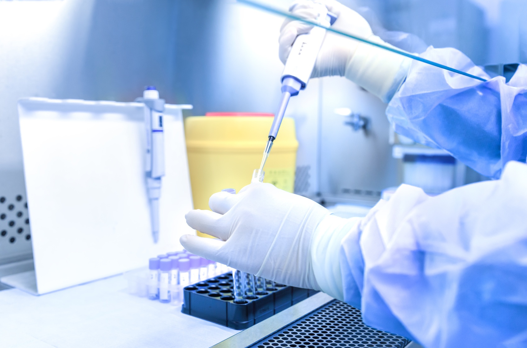 The scientist experimented in the laboratory